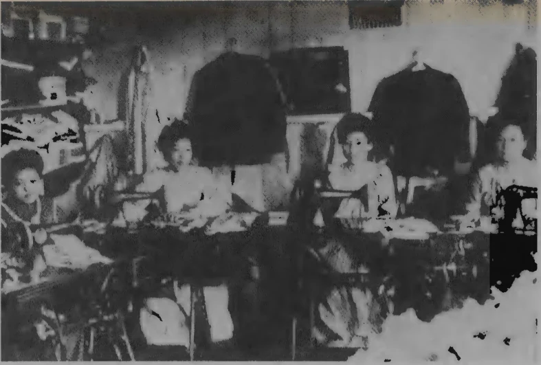 Japanese immigrant women sewing garments on a Hawaiian plantation