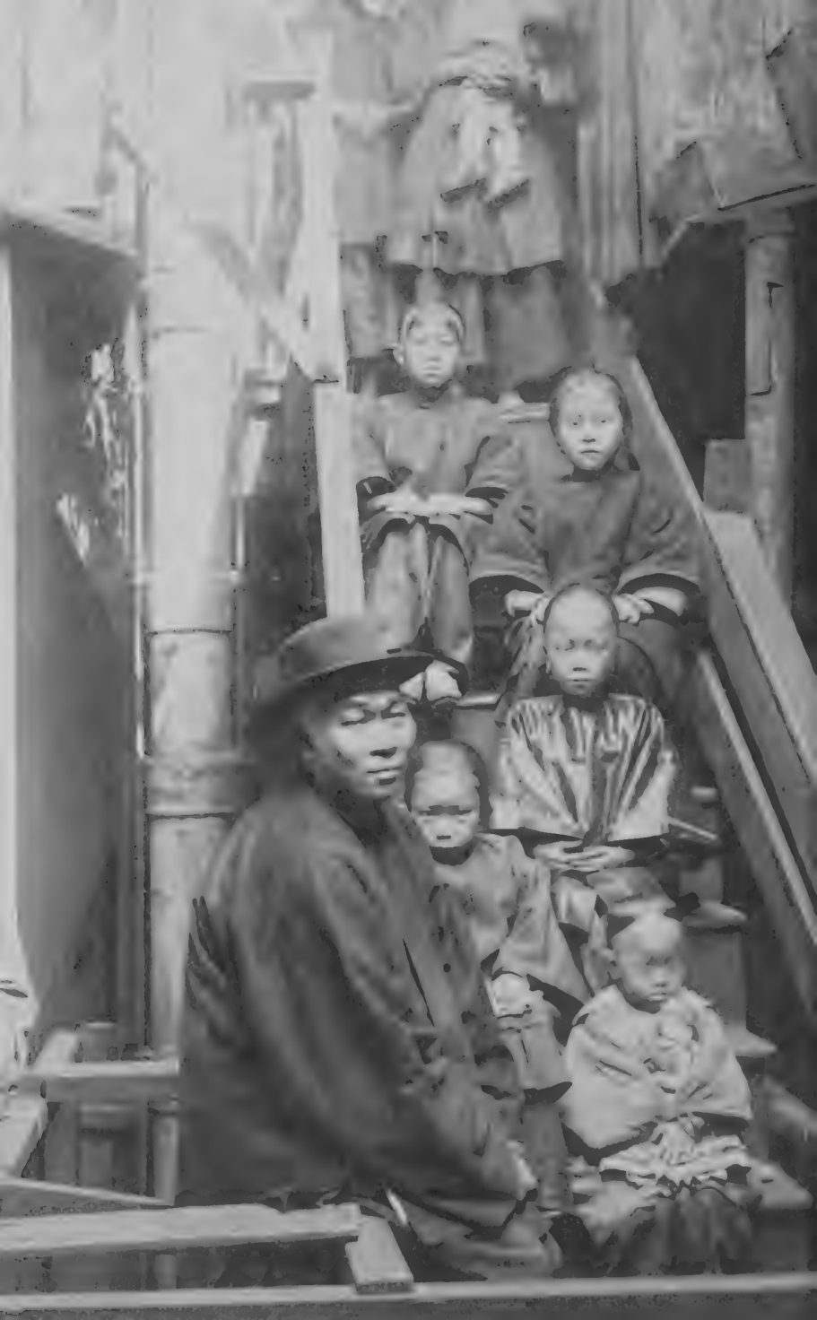 Photograph of Chinese Americans in a tenement in San Francisco’s Chinatown, around 1890.