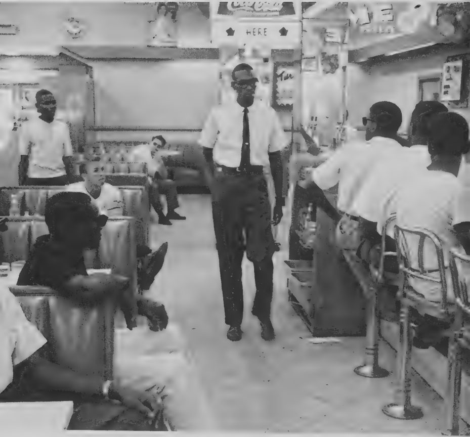 Photograph of a sit-in at a whites-only lunch counter in St. Petersburg, Florida, around 1960.